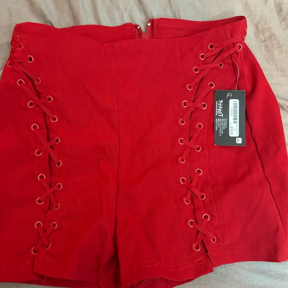 Red shorts with zipper in the back cute front red criss cross size large $13